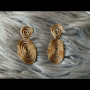 Gold cultural earrings
